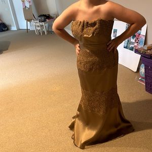 This is a tan colored dress and it is a size 10,